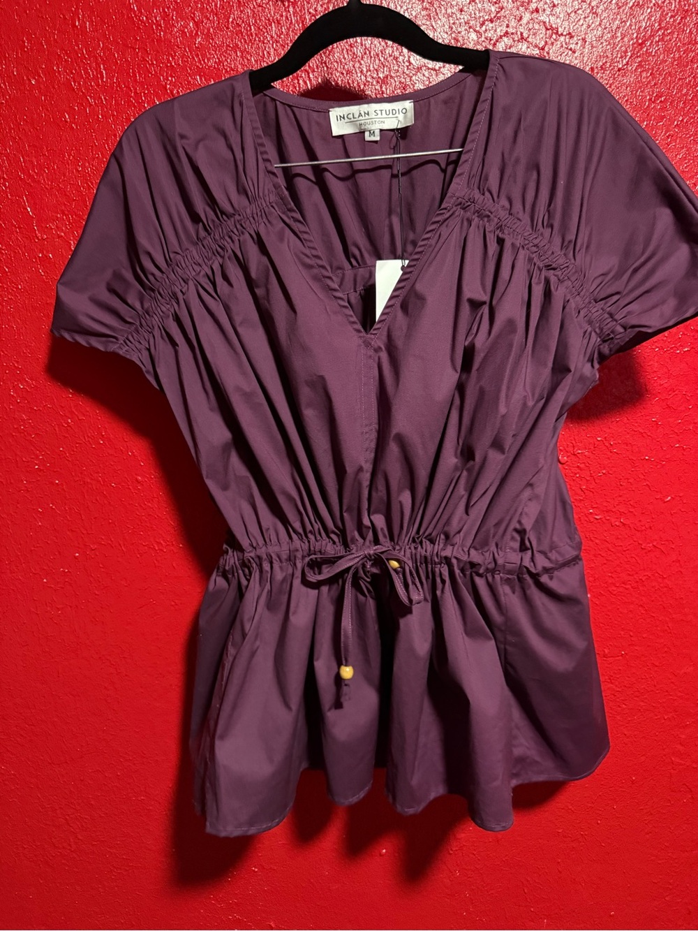 154. NWT Plum V-Neck Drawstring Peplum Blouse